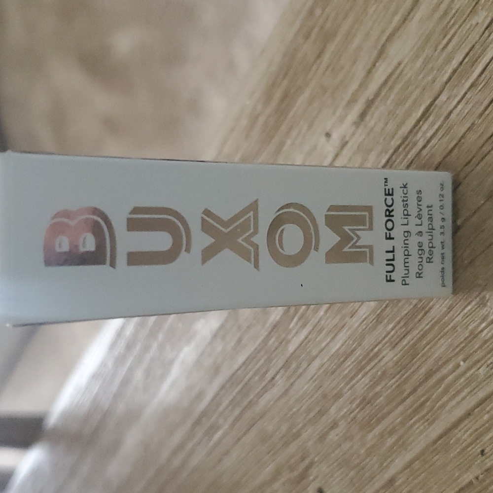 Buxom Full Force plumping lipstick in color Influncer